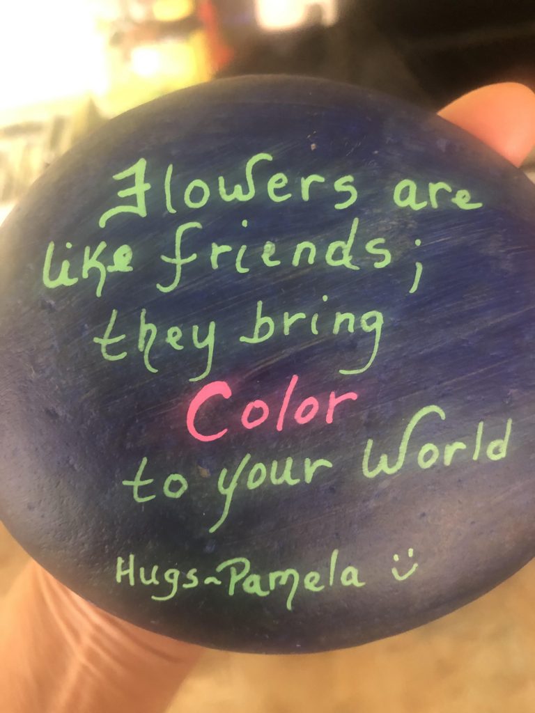 Decorative painted rock to spread joy, health, and wellness. 